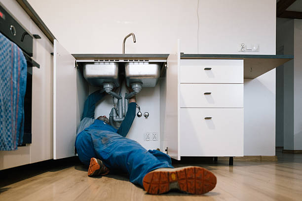 Professional Emergency Plumber technician working in Marshall, MI